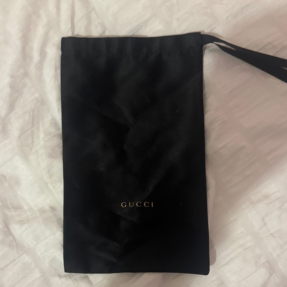 Gucci Black and Gold Logo Pouch